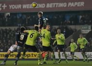 Aston Villa's Irish striker Andy Keogh (C) heads the ball on January 25, 2013